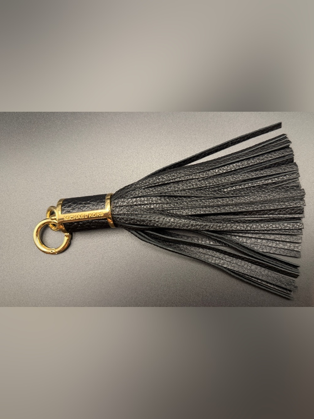 Michael Kors Black Leather Tassel Key Charm with Gold Accent